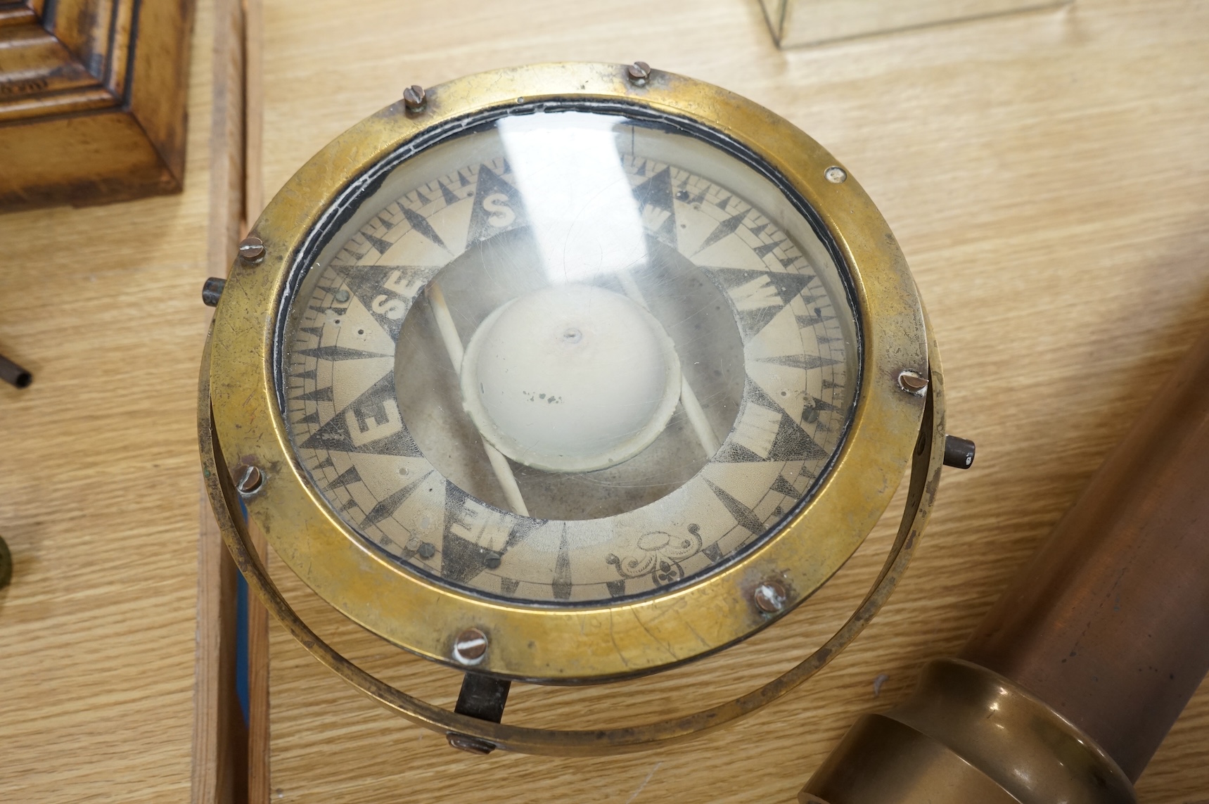 A brass ship's compass in gimbal and a copper water hydrant, 95.5cm